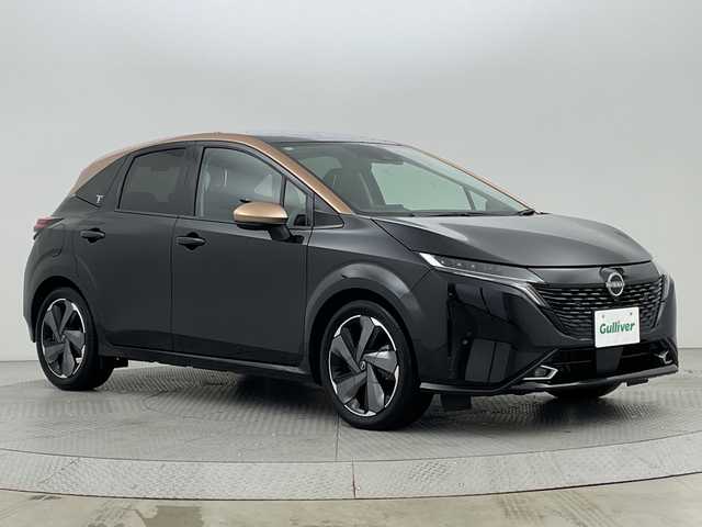日産 オーラ G レザーエディション 新潟県 2024(令6)年 0.7万km ミッドナイトブラック/サンライズカッパー エマージェンシーブレーキ/スマートルームミラー/ワイヤレス充電/純正ナビ/フルセグTV/Bluetooth/アラウンドビューモニター/プロパイロット/LEDオートライト/オートハイビーム/シートヒーター/ステアリングヒーター/純正17インチアルミホイール/ステアリングリモコン/電格ミラー/ウィンカーミラー/スマートキー/ビルトインETC2.0