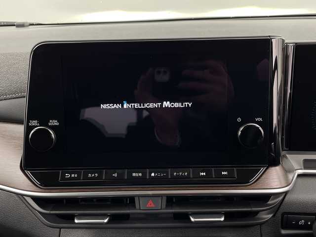 日産 オーラ G レザーエディション 新潟県 2024(令6)年 0.7万km ミッドナイトブラック/サンライズカッパー エマージェンシーブレーキ/スマートルームミラー/ワイヤレス充電/純正ナビ/フルセグTV/Bluetooth/アラウンドビューモニター/プロパイロット/LEDオートライト/オートハイビーム/シートヒーター/ステアリングヒーター/純正17インチアルミホイール/ステアリングリモコン/電格ミラー/ウィンカーミラー/スマートキー/ビルトインETC2.0