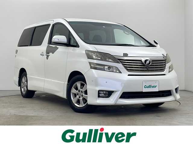トヨタ ヴェルファイア 2．4Z プラチナセレクションⅡ 秋田県 2010(平22)年 13.2万km ホワイトパールクリスタルシャイン ４ＷＤ/ＥＴＣ/スマートキー/スペアキー有/純正ナビ（ＡＭ／ＦＭ／ＣＤ／ＢＴ／ＤＶＤ）フルセグ/バックモニター/１００V電源/ウインカーミラー/コーナーセンサー/クリアランスソナー/プッシュスタート/オットマン/純正フロアマット/コーナーセンサー/カーテンエアバック/エアバック（W＋サイド）/両側パワースライドドア/横滑防止装置/ＡＢＳ/衝突被害軽減システム/保証書/取扱説明書