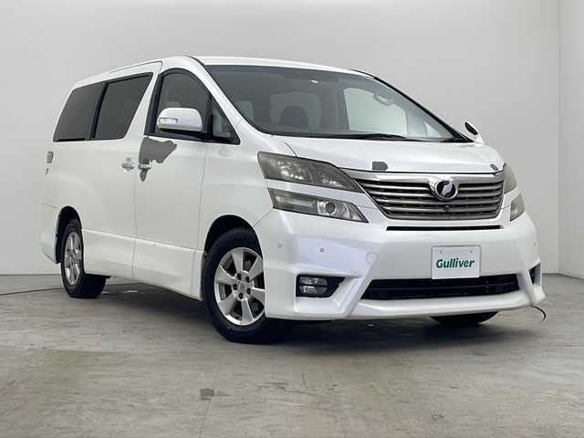 トヨタ ヴェルファイア 2．4Z プラチナセレクションⅡ 秋田県 2010(平22)年 13.2万km ホワイトパールクリスタルシャイン ４ＷＤ/ＥＴＣ/スマートキー/スペアキー有/純正ナビ（ＡＭ／ＦＭ／ＣＤ／ＢＴ／ＤＶＤ）フルセグ/バックモニター/１００V電源/ウインカーミラー/コーナーセンサー/クリアランスソナー/プッシュスタート/オットマン/純正フロアマット/コーナーセンサー/カーテンエアバック/エアバック（W＋サイド）/両側パワースライドドア/横滑防止装置/ＡＢＳ/衝突被害軽減システム/保証書/取扱説明書