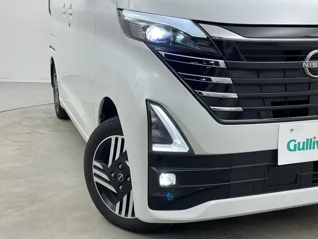 日産 ルークス HWS X プロパイロットED 新潟県 2023(令5)年 6.5万km ホワイトパール 4WD/純正メモリナビ【MJ122D-W】/　フルセグTV/Bluetooth/CD/USB/プロパイロット/衝突被害軽減ブレーキ/レーンキープアシスト/レーダークルーズコントロール/両側パワースライドドア/アラウンドビューモニター/インテリジェントルームミラー/前席シートヒーター/ステアリングヒーター/ビルトインETC/前後コーナーセンサー/アイドリングストップ/LEDヘッドライト/レザーステアリング