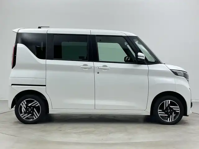 日産 ルークス HWS X プロパイロットED 新潟県 2023(令5)年 6.5万km ホワイトパール 4WD/純正メモリナビ【MJ122D-W】/　フルセグTV/Bluetooth/CD/USB/プロパイロット/衝突被害軽減ブレーキ/レーンキープアシスト/レーダークルーズコントロール/両側パワースライドドア/アラウンドビューモニター/インテリジェントルームミラー/前席シートヒーター/ステアリングヒーター/ビルトインETC/前後コーナーセンサー/アイドリングストップ/LEDヘッドライト/レザーステアリング