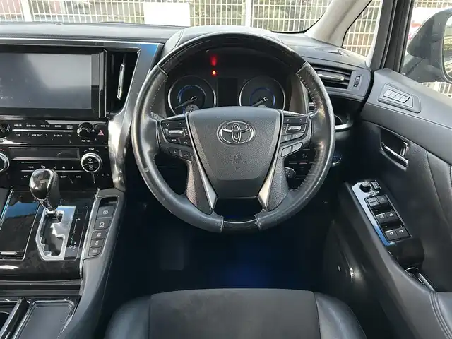 トヨタ アルファードハイブリット SR 道央・札幌 2015(平27)年 11.4万km スパークリングブラックパールクリスタルシャイン ユーザー買取車両/純正HDDナビ/【AM/FM/TV/BT/CD/SD】/純正17インチAW/JBLサウンド/エンジンスタートボタン/MTモード付AT/アイドリンクストップ/スマートキー/スペアキー×１/クルーズコントロール/ETC/USB入力端子/バックカメラ/ドライブレコーダー/両側パワースライドドア/100V電源/オットマン/3列シート/サンルーフ/パワーシート/ハーフレザーシート/AC100電源/ウォークスルー/コーナーセンサー/横滑り防止装置/衝突被害軽減システム/保証書/取扱説明書