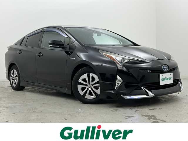 トヨタ プリウス A 宮城県 2016(平28)年 8万km アティチュードブラックマイカ 禁煙車/社外エアロパーツ/トヨタセーフティーセンス/・プリクラッシュセーフティーシステム/・レーンディバ―チャーアラート/・オートマチックハイビーム/・レーダークルーズコントロール/・インテリジェントクリアランスソナー/ブラインドスポットモニター/ヘッドアップディスプレイ/純正7インチナビ/地図SD無し/・BT.CD.DVD.SD/フルセグテレビ/ビルトインETC/社外ドライブレコーダー/LEDヘッドライト/LEDフォグランプ/革巻きステアリング/ステアリングスイッチ/横滑り防止機能/アイドリングストップ/プッシュスタート/スマートキー（2本）/防眩ルームミラー/純正15インチスチールキャップ/純正フロアマット/純正ドアバイザー