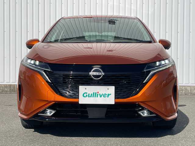 日産 オーラ G レザーエディション 福岡県 2021(令3)年 1.7万km プレミアムコロナオレンジ ・プロパイロット /・全周囲カメラ /・レザーシート /・寒冷地仕様車 /・インテリジェントルームミラー /・フルセグTV ステアリングヒーター /・D/N席シートヒーター /・BSM /・ACC エマージェンシーブレーキ LDA /・オートLEDライト/LEDフォグ/オートハイビーム/・パワーモードセレクト/・電格ミラー/・スマートキー/プッシュスタート