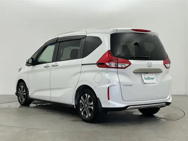 ホンダ フリード クロスター ホンダセンシング 富山県 2020(令2)年 3.9万km プラチナホワイトパール 社外ナビ(AM/FM/BT/CD/DVD)/フルセグTV/バックカメラ/エンジンスターター/レーダークルーズコントロール/衝突軽減装置/レーンキープアシスト/両側パワースライドドア/ウインドシールドデアイサー/アイドリングストップ/横滑り防止装置/ETC/後方コーナーセンサー/前席シートヒーター/LEDヘッドライト/オートライト/純正AW/社外フロアマット/フォグランプ/スマートキー/スペアキー1本/プッシュスタート/取扱説明書/保証書