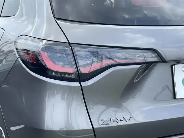 ホンダ ＺＲ－Ｖ ハイブリッド e:HEV Z 茨城県 2023(令5)年 1.4万km スーパープラチナグレーメタリック 純正ナビ/【AM・FM・USB・BT・TV】/パワーシート/シートメモリ/シートヒーター/電動リアゲート/ワイヤレス充電/ダウンヒルアシストコントロール/ブレーキホールド/レーダークルコン/ETC2.0/全方位カメラ/前後ドラレコ/前後コーナーセンサー/パドルシフト/純正フロアマット/純正アルミホイール/横滑り防止装置/レーンキープアシスト/衝突被害軽減システム