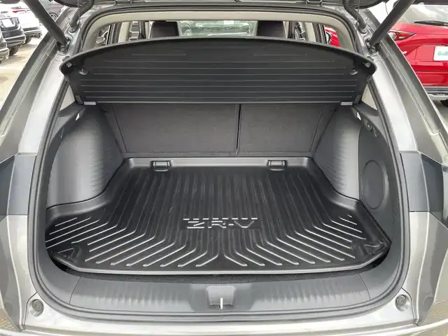 ホンダ ＺＲ－Ｖ ハイブリッド e:HEV Z 茨城県 2023(令5)年 1.4万km スーパープラチナグレーメタリック 純正ナビ/【AM・FM・USB・BT・TV】/パワーシート/シートメモリ/シートヒーター/電動リアゲート/ワイヤレス充電/ダウンヒルアシストコントロール/ブレーキホールド/レーダークルコン/ETC2.0/全方位カメラ/前後ドラレコ/前後コーナーセンサー/パドルシフト/純正フロアマット/純正アルミホイール/横滑り防止装置/レーンキープアシスト/衝突被害軽減システム