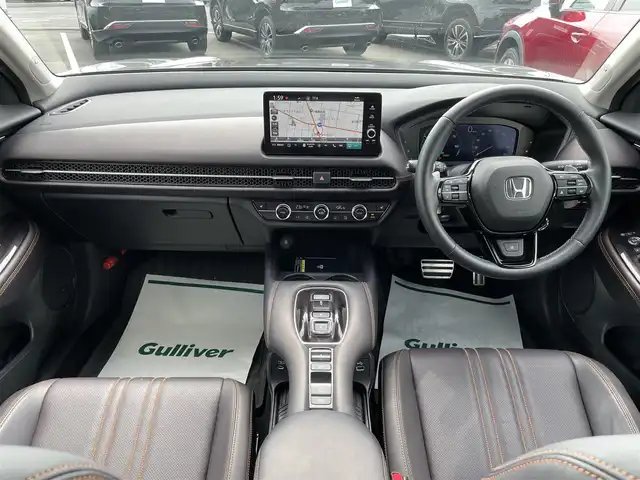 ホンダ ＺＲ－Ｖ ハイブリッド e:HEV Z 茨城県 2023(令5)年 1.4万km スーパープラチナグレーメタリック 純正ナビ/【AM・FM・USB・BT・TV】/パワーシート/シートメモリ/シートヒーター/電動リアゲート/ワイヤレス充電/ダウンヒルアシストコントロール/ブレーキホールド/レーダークルコン/ETC2.0/全方位カメラ/前後ドラレコ/前後コーナーセンサー/パドルシフト/純正フロアマット/純正アルミホイール/横滑り防止装置/レーンキープアシスト/衝突被害軽減システム