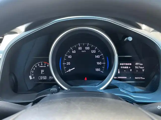 ホンダ フィット 13G FパックコンフォートED 奈良県 2018(平30)年 7万km クリスタルブラックパール 純正ナビ　/フルセグＴＶ/BT/CD/DVD/SD/USB/AUX/iPod/バックカメラ　/追従型クルーズコントロール　/ビルトインＥＴＣ　/ＡＡＣ　/シートヒーター　/ＬＥＤヘッドライト　/オートライト　/衝突被害軽減システム　/レーンキープアシスト　/スマートキー/盗難防止装置/社外15インチアルミホイール/純正フロアマット