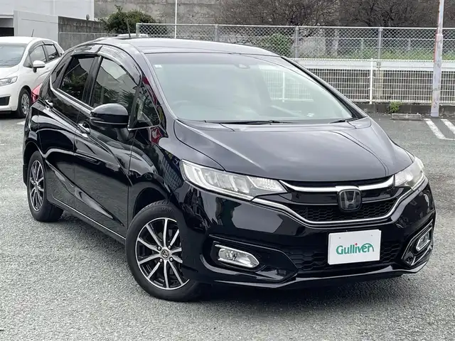 ホンダ フィット 13G FパックコンフォートED 熊本県 2018(平30)年 7万km クリスタルブラックパール ホンダセンシング/プッシュスタート/純正ナビ/（CD・DVD・フルセグTV・BTオーディオ・SD）/バックカメラ/ビルトインETC/社外15インチAW/レーダークルーズ/前席シートヒーター/LEDヘッドライト/オートライト/LEDフォグライト/横滑り防止装置/ウィンカーミラー/純正フロアマット/純正ドアバイザー/スマートスペアキー×1本