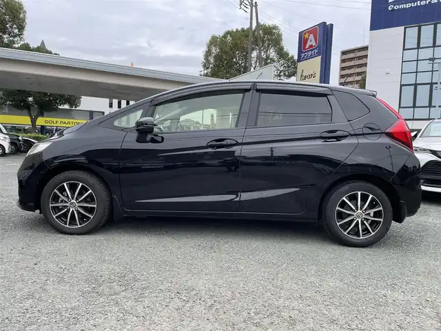 ホンダ フィット 13G FパックコンフォートED 熊本県 2018(平30)年 7万km クリスタルブラックパール ホンダセンシング/プッシュスタート/純正ナビ/（CD・DVD・フルセグTV・BTオーディオ・SD）/バックカメラ/ビルトインETC/社外15インチAW/レーダークルーズ/前席シートヒーター/LEDヘッドライト/オートライト/LEDフォグライト/横滑り防止装置/ウィンカーミラー/純正フロアマット/純正ドアバイザー/スマートスペアキー×1本