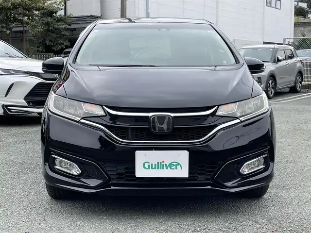 ホンダ フィット 13G FパックコンフォートED 熊本県 2018(平30)年 7万km クリスタルブラックパール ホンダセンシング/プッシュスタート/純正ナビ/（CD・DVD・フルセグTV・BTオーディオ・SD）/バックカメラ/ビルトインETC/社外15インチAW/レーダークルーズ/前席シートヒーター/LEDヘッドライト/オートライト/LEDフォグライト/横滑り防止装置/ウィンカーミラー/純正フロアマット/純正ドアバイザー/スマートスペアキー×1本