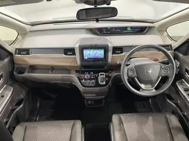 ホンダ フリード ハイブリット G ホンダセンシング 愛知県 2020(令2)年 4.7万km プレミアムクリスタルオレンジM KENWOOD7インチナビ/（Bluetooth/AM/FM/フルセグTV）/衝突軽減ブレーキ/両側電動スライドドア/レーダークルーズコントロール/シートヒーター/LEDヘッドライト/ETC/バックカメラ/コーナーセンサー/レーンキープアシスト/プッシュスタートボタン/スマートキー/純正15インチAW/社外ホイール付きスタッドレス