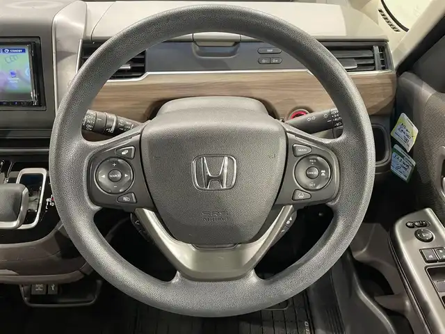ホンダ フリード ハイブリット G ホンダセンシング 愛知県 2020(令2)年 4.7万km プレミアムクリスタルオレンジM KENWOOD7インチナビ/（Bluetooth/AM/FM/フルセグTV）/衝突軽減ブレーキ/両側電動スライドドア/レーダークルーズコントロール/シートヒーター/LEDヘッドライト/ETC/バックカメラ/コーナーセンサー/レーンキープアシスト/プッシュスタートボタン/スマートキー/純正15インチAW/社外ホイール付きスタッドレス