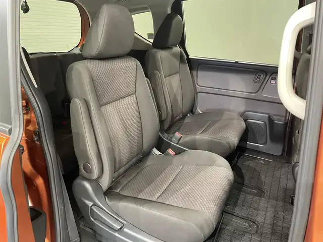 ホンダ フリード ハイブリット G ホンダセンシング 愛知県 2020(令2)年 4.7万km プレミアムクリスタルオレンジM KENWOOD7インチナビ/（Bluetooth/AM/FM/フルセグTV）/衝突軽減ブレーキ/両側電動スライドドア/レーダークルーズコントロール/シートヒーター/LEDヘッドライト/ETC/バックカメラ/コーナーセンサー/レーンキープアシスト/プッシュスタートボタン/スマートキー/純正15インチAW/社外ホイール付きスタッドレス