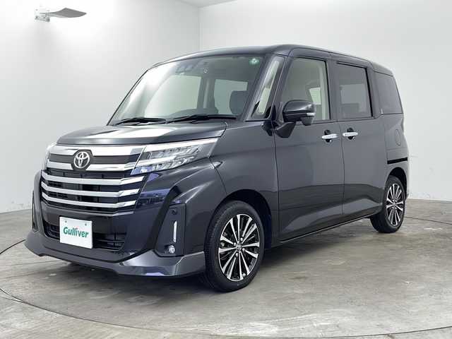 トヨタ ルーミー カスタムG－T 兵庫県 2022(令4)年 0.4万km ブラックマイカメタリック ・ワンオーナー/・純正ナビ/CD/DVD/BT/USB/SD/TV/・全方位カメラ/・プリクラッシュセーフティ/・レーンディパーチャーアラート/・レーダークルーズコントロール/・クリアランスソナー/・オートマチックハイビーム/・アイドリングストップ/・ビークルスタビリティコントロール/・LEDヘッドライト/・オートライト/・フォグランプ/・両側パワースライドドア/・ウェルカムパワースライドドア/・ステアリングリモコン/・前席シートヒーター/・前後ドライブレコーダー/・ビルトインETC/・純正フロアマット/・純正15インチアルミホイール/・革調シートカバー/・電動格納ミラー/・ウィンカーミラー/・スマートキー/・スペアキー/・プッシュスタート