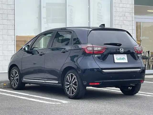 ホンダ フィット e:HEVリュクス 宮崎県 2023(令5)年 2.4万km ミッドナイトブルービームM ワンオーナー/純正ナビ/(AM.FM.Bluetooth.USB)/アラウンドビューモニター/ドライブレコーダー/ETC2.0/レーダークルーズコントロール/シートヒーター/ハンドルヒーター/オートライト/電格ミラー/パワーステアリング/スマートキー/スペアキー/衝突軽減ブレーキ/横滑り防止機能/レーンキープアシスト