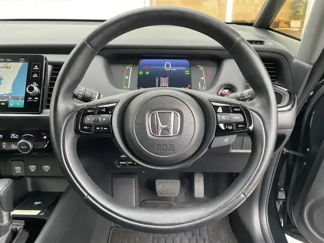 ホンダ フィット e:HEVリュクス 宮崎県 2023(令5)年 2.4万km ミッドナイトブルービームM ワンオーナー/純正ナビ/(AM.FM.Bluetooth.USB)/アラウンドビューモニター/ドライブレコーダー/ETC2.0/レーダークルーズコントロール/シートヒーター/ハンドルヒーター/オートライト/電格ミラー/パワーステアリング/スマートキー/スペアキー/衝突軽減ブレーキ/横滑り防止機能/レーンキープアシスト