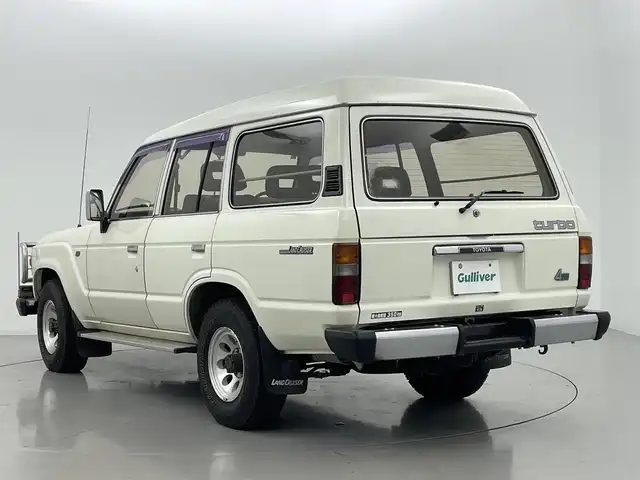 トヨタ ランドクルーザー VX 熊本県 1985(昭60)年 7.7万km 白 サンルーフ　/電動ウインチ/４ＷＤ　/ハイルーフ　/純正ラジオ/社外ＥＴＣ　/グリルガード　/ドアバイザー　/パワーウィンドウ　/パワーステアリング　/純正フロアマット　/社外１５インチＡＷ　/保証書　/取扱説明書