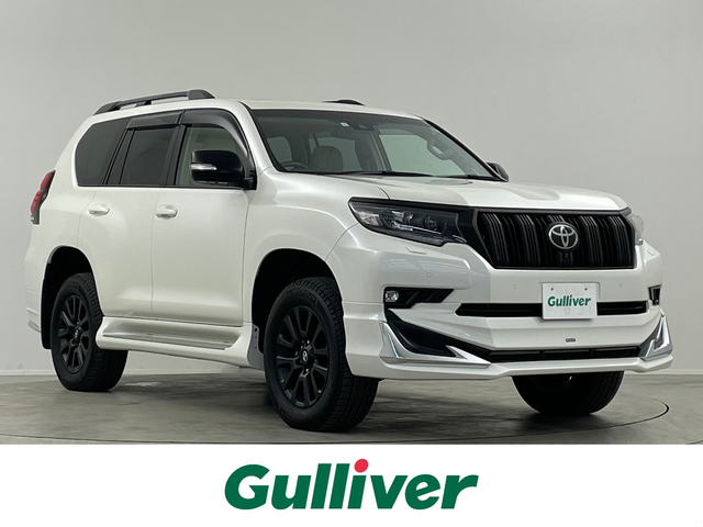 トヨタ ランドクルーザー プラド TX Lパッケージ マットブラED 埼玉県 2023(令5)年 2.6万km ホワイトパールクリスタルシャイン サンルーフ　モデリスタ純正９型ナビ　全方位　シートヒーター　ベンチレーションレーダークルーズコントロール　レーンキープアシスト　オートハイビームパワーシート　三列シートリア席電動格納　ＥＴＣ