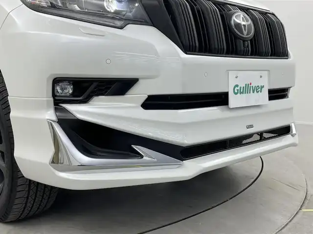 トヨタ ランドクルーザー プラド TX Lパッケージ マットブラED 埼玉県 2023(令5)年 2.6万km ホワイトパールクリスタルシャイン サンルーフ　モデリスタ純正９型ナビ　全方位　シートヒーター　ベンチレーションレーダークルーズコントロール　レーンキープアシスト　オートハイビームパワーシート　三列シートリア席電動格納　ＥＴＣ