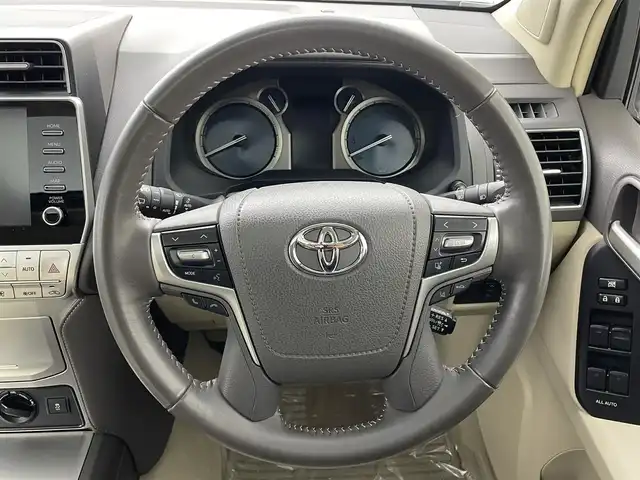 トヨタ ランドクルーザー プラド TX Lパッケージ マットブラED 埼玉県 2023(令5)年 2.6万km ホワイトパールクリスタルシャイン サンルーフ　モデリスタ純正９型ナビ　全方位　シートヒーター　ベンチレーションレーダークルーズコントロール　レーンキープアシスト　オートハイビームパワーシート　三列シートリア席電動格納　ＥＴＣ