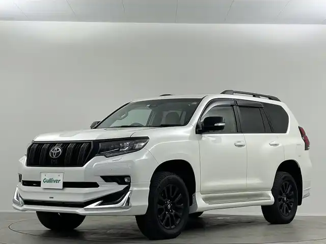 トヨタ ランドクルーザー プラド TX Lパッケージ マットブラED 埼玉県 2023(令5)年 2.6万km ホワイトパールクリスタルシャイン サンルーフ　モデリスタ純正９型ナビ　全方位　シートヒーター　ベンチレーションレーダークルーズコントロール　レーンキープアシスト　オートハイビームパワーシート　三列シートリア席電動格納　ＥＴＣ