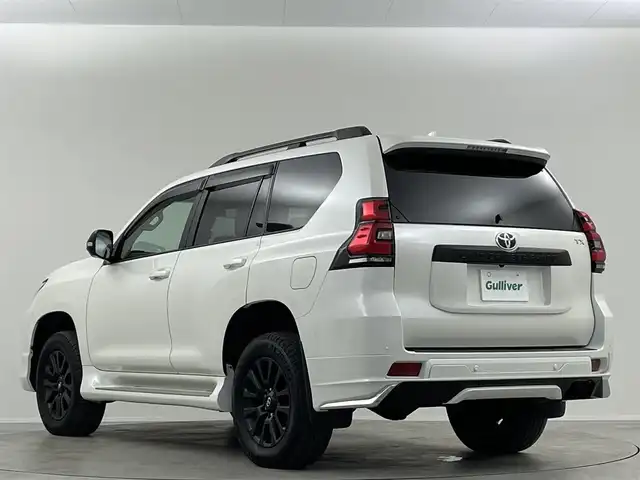 トヨタ ランドクルーザー プラド TX Lパッケージ マットブラED 埼玉県 2023(令5)年 2.6万km ホワイトパールクリスタルシャイン サンルーフ　モデリスタ純正９型ナビ　全方位　シートヒーター　ベンチレーションレーダークルーズコントロール　レーンキープアシスト　オートハイビームパワーシート　三列シートリア席電動格納　ＥＴＣ
