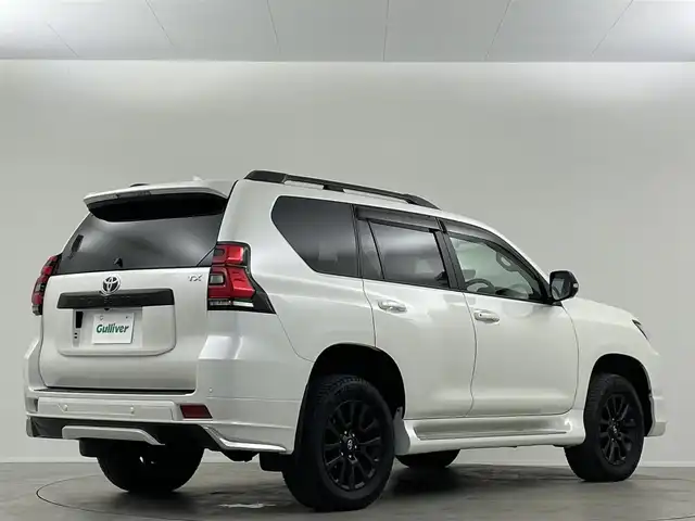 トヨタ ランドクルーザー プラド TX Lパッケージ マットブラED 埼玉県 2023(令5)年 2.6万km ホワイトパールクリスタルシャイン サンルーフ　モデリスタ純正９型ナビ　全方位　シートヒーター　ベンチレーションレーダークルーズコントロール　レーンキープアシスト　オートハイビームパワーシート　三列シートリア席電動格納　ＥＴＣ