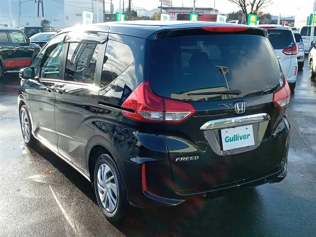 ホンダ フリード G ホンダセンシング 福井県 2020(令2)年 3.6万km クリスタルブラックパール 純正9インチナビ/AM/FM/フルセグ/BT/CD/DVD/バックカメラ/純正後席フリップダウンモニター/両側パワースライドドア/アダプティブクルーズコントロール/衝突被害軽減システム/レーンキープアシスト/横滑り防止装置/盗難防止装置/アイドリングストップ/ビルトインETC/ダブルエアバッグ/純正フロアマット/LEDヘッドライト/純正ホイルキャップ/スマートキー