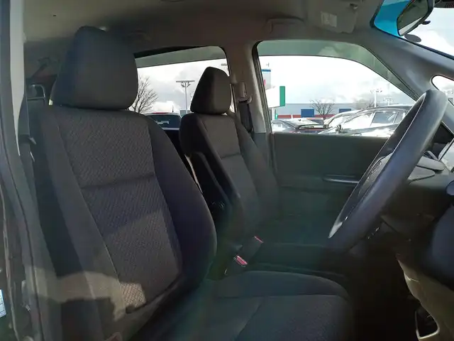 ホンダ フリード G ホンダセンシング 福井県 2020(令2)年 3.6万km クリスタルブラックパール 純正9インチナビ/AM/FM/フルセグ/BT/CD/DVD/バックカメラ/純正後席フリップダウンモニター/両側パワースライドドア/アダプティブクルーズコントロール/衝突被害軽減システム/レーンキープアシスト/横滑り防止装置/盗難防止装置/アイドリングストップ/ビルトインETC/ダブルエアバッグ/純正フロアマット/LEDヘッドライト/純正ホイルキャップ/スマートキー