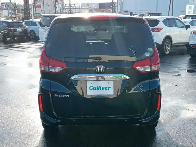 ホンダ フリード G ホンダセンシング 福井県 2020(令2)年 3.6万km クリスタルブラックパール 純正9インチナビ/AM/FM/フルセグ/BT/CD/DVD/バックカメラ/純正後席フリップダウンモニター/両側パワースライドドア/アダプティブクルーズコントロール/衝突被害軽減システム/レーンキープアシスト/横滑り防止装置/盗難防止装置/アイドリングストップ/ビルトインETC/ダブルエアバッグ/純正フロアマット/LEDヘッドライト/純正ホイルキャップ/スマートキー
