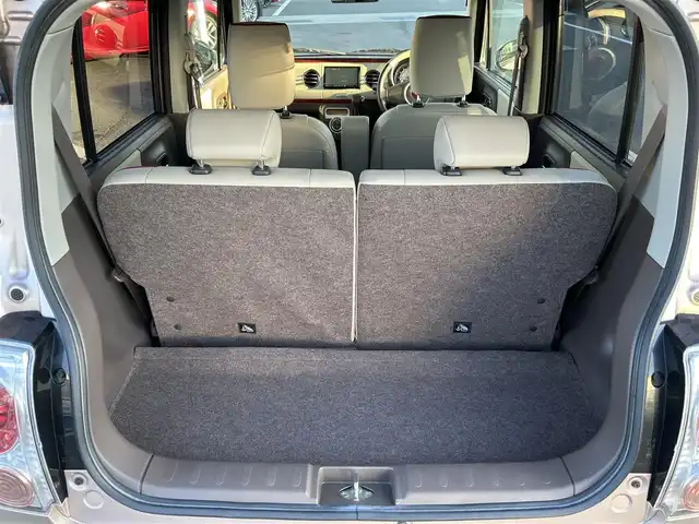 スズキ ラパン ショコラ X 愛媛県 2014(平26)年 4.4万km ピンク パナソニック製ナビ/BT/AM・FM/CD/DVD/バックカメラ/ETC/AAC/スマートキー/純正フロアマット/純正ホイールキャップ/アイドリングストップ/ベンチシート