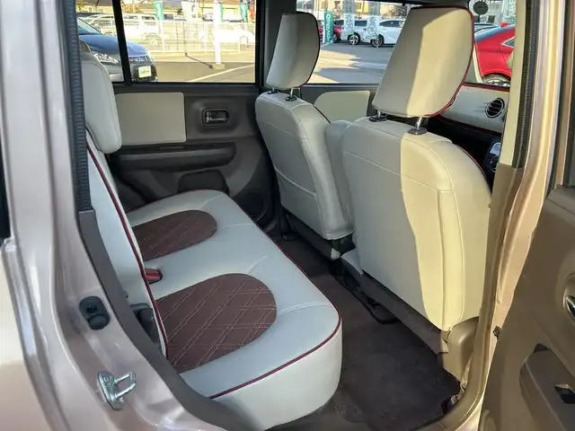 スズキ ラパン ショコラ X 愛媛県 2014(平26)年 4.4万km ピンク パナソニック製ナビ/BT/AM・FM/CD/DVD/バックカメラ/ETC/AAC/スマートキー/純正フロアマット/純正ホイールキャップ/アイドリングストップ/ベンチシート