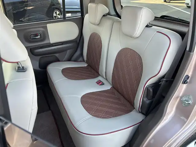 スズキ ラパン ショコラ X 愛媛県 2014(平26)年 4.4万km ピンク パナソニック製ナビ/BT/AM・FM/CD/DVD/バックカメラ/ETC/AAC/スマートキー/純正フロアマット/純正ホイールキャップ/アイドリングストップ/ベンチシート