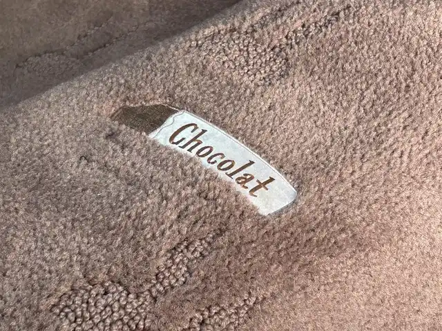 スズキ ラパン ショコラ X 愛媛県 2014(平26)年 4.4万km ピンク パナソニック製ナビ/BT/AM・FM/CD/DVD/バックカメラ/ETC/AAC/スマートキー/純正フロアマット/純正ホイールキャップ/アイドリングストップ/ベンチシート