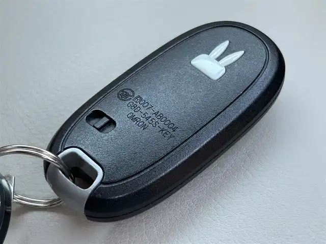 スズキ ラパン ショコラ X 愛媛県 2014(平26)年 4.4万km ピンク パナソニック製ナビ/BT/AM・FM/CD/DVD/バックカメラ/ETC/AAC/スマートキー/純正フロアマット/純正ホイールキャップ/アイドリングストップ/ベンチシート