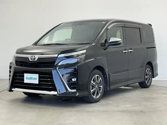 トヨタ ヴォクシー ZS 煌Ⅲ 新潟県 2021(令3)年 6.6万km ブラック 純正メモリナビ/　フルセグTV/Bluetooth/CD/DVD/衝突被害軽減ブレーキ/レーンキープアシスト/前後コーナーセンサー/クルーズコントロール/前後ドライブレコーダー【GL-05AP】/ハーフレザーシート/両側パワースライドドア/バックモニター/ビルトインETC2.0/アイドリングストップ/横滑り防止装置/LEDヘッドライト/オートマチックハイビーム/オートライト/ステアリングスイッチ/禁煙車