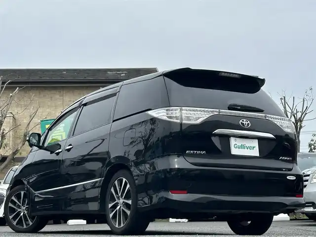 トヨタ エスティマ アエラス プレミアムエディション 東京都 2016(平28)年 8.5万km ブラック ワンオーナー/carrozeria7インチメモリナビ(AVIC-RW99)/・DVD/CD/フルセグTV/Bluetooth接続/AUX/USB/バックカメラ/両側パワースライドドア/収納3列シート/オットマン/運転席パワーシート/クルーズコントロール/スペアキー/保証書/取扱説明書
