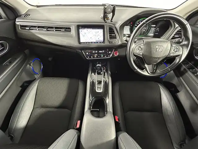 ホンダ ヴェゼル ハイブリッド Z ホンダセンシング 佐賀県 2018(平30)年 12万km クリスタルブラックパール 純正9インチナビ/ＡＭ/ＦＭ/CD/DVD/Bluetooth/フルセグTV/バックカメラ/レーダークルーズコントロール/衝突被害軽減システム/レーンアシスト/シートヒーター/ビルトインETC/ハーフレザーシート/LEDヘッドライト/フォグランプ/オートエアコン/盗難防止装置/横滑り防止装置/車線逸脱警報/オートライト/オートマチックハイビーム/スマートキー/プッシュスタート/電子パーキング/オートブレーキホールド/純正フロアマット/純正1７インチアルミホイール	/ステアリングスイッチ/電動格納ミラー/アイドリングストップ