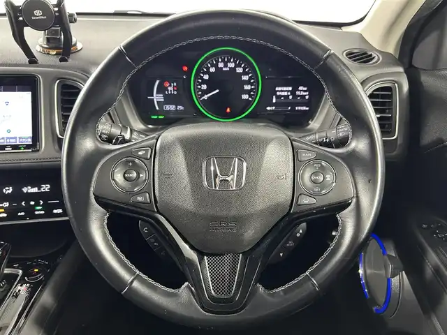 ホンダ ヴェゼル ハイブリッド Z ホンダセンシング 佐賀県 2018(平30)年 12万km クリスタルブラックパール 純正9インチナビ/ＡＭ/ＦＭ/CD/DVD/Bluetooth/フルセグTV/バックカメラ/レーダークルーズコントロール/衝突被害軽減システム/レーンアシスト/シートヒーター/ビルトインETC/ハーフレザーシート/LEDヘッドライト/フォグランプ/オートエアコン/盗難防止装置/横滑り防止装置/車線逸脱警報/オートライト/オートマチックハイビーム/スマートキー/プッシュスタート/電子パーキング/オートブレーキホールド/純正フロアマット/純正1７インチアルミホイール	/ステアリングスイッチ/電動格納ミラー/アイドリングストップ