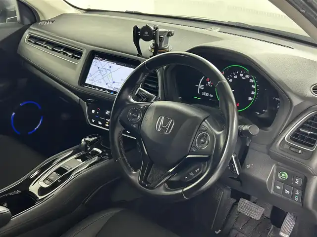 ホンダ ヴェゼル ハイブリッド Z ホンダセンシング 佐賀県 2018(平30)年 12万km クリスタルブラックパール 純正9インチナビ/ＡＭ/ＦＭ/CD/DVD/Bluetooth/フルセグTV/バックカメラ/レーダークルーズコントロール/衝突被害軽減システム/レーンアシスト/シートヒーター/ビルトインETC/ハーフレザーシート/LEDヘッドライト/フォグランプ/オートエアコン/盗難防止装置/横滑り防止装置/車線逸脱警報/オートライト/オートマチックハイビーム/スマートキー/プッシュスタート/電子パーキング/オートブレーキホールド/純正フロアマット/純正1７インチアルミホイール	/ステアリングスイッチ/電動格納ミラー/アイドリングストップ