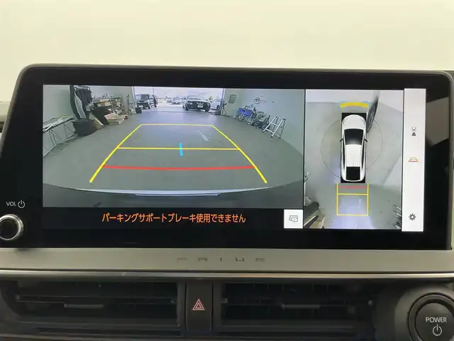 トヨタ プリウス Z 富山県 2024(令6)年 1.6万km プラチナホワイトパールマイカ 12.3インチDA（AM/FM/BT/USB）/・ナビ機能有/・AppleCarplay/・AndroidAuto/フルセグTV（キャンセラー付）/全方位カメラ/プリクラッシュセーフティシステム/レーンキープアシスト/レーダークルーズコントロール/クリアランスソナー/パーキングアシスト/BSM/PDA/RCTA/RCD/PKSB/RSA/LCA/FCTA/安心降車アシスト/周辺車両接近時サポート/後方車両接近告知/ドライブレコーダー/レザーシート/D席メモリ付パワーシート/前席シートヒーター/前席エアシート/ハンドルヒーター/ビルトインETC2.0/ワイヤレス充電/100V電源/横滑り防止装置/コーナーセンサー/パーキングアシスト/電動リアゲート/電格ウィンカーミラー/電動パーキングブレーキ/オートブレーキホールド/LEDヘッドライト/フォグランプ/プッシュスタート/スマートキー/保証書/取扱説明書