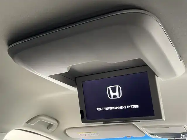 ホンダ オデッセイ アブソルート EX ADV 大分県 2015(平27)年 7.4万km ホワイトオーキッドパール 純正ナビ/（フルセグ/CD/DVD/Bluetooth）/全方位カメラ/フリップダウンモニター/ビルトインETC/前方ドライブレコーダー/衝突軽減ブレーキ/ブラインドスポットモニター/レーダークルーズコントロール/レザーシート/前席シートヒーター/運転席パワーシート/両側パワースライドドア/ステアリングスイッチ/保証書・取扱説明書/カーテンエアバッグ