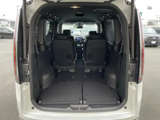 ホンダ ステップワゴン スパーダ 東京都 2025(令7)年 0.1万km パール 純正9型ホンダコネクトナビ＆フルセグ　/・AppleCarPlay＆AndroidAuto/・BluetoothAudio/両側パワースライドドア　/パワーバックドア　/ブラインドスポットモニター　/ホンダセンシング/（安全運転支援システム）/・衝突軽減ブレーキ/・後方誤発進抑制機能/・歩行者事故低減ステアリング/・渋滞追従機能付クルーズコントロール/・車線維持支援システム/・先行者発進お知らせ機能/・誤発進抑制/・近距離衝突軽減ブレーキ/・標識認識機能/撥水ファブリックコンビシート /・前席シートヒーター/・キャプテンシート /・オットマンシート/ＬＥＤヘッドライト /シートバックテーブル/ビルトインETC/プッシュエンジンスタート/スマートキー/保証書＆取説