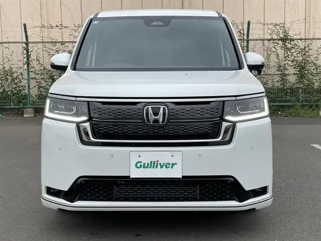 ホンダ ステップワゴン スパーダ 東京都 2025(令7)年 0.1万km パール 純正9型ホンダコネクトナビ＆フルセグ　/・AppleCarPlay＆AndroidAuto/・BluetoothAudio/両側パワースライドドア　/パワーバックドア　/ブラインドスポットモニター　/ホンダセンシング/（安全運転支援システム）/・衝突軽減ブレーキ/・後方誤発進抑制機能/・歩行者事故低減ステアリング/・渋滞追従機能付クルーズコントロール/・車線維持支援システム/・先行者発進お知らせ機能/・誤発進抑制/・近距離衝突軽減ブレーキ/・標識認識機能/撥水ファブリックコンビシート /・前席シートヒーター/・キャプテンシート /・オットマンシート/ＬＥＤヘッドライト /シートバックテーブル/ビルトインETC/プッシュエンジンスタート/スマートキー/保証書＆取説
