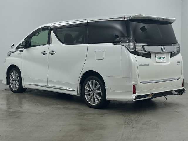 トヨタ ヴェルファイア ハイブリット 道央・札幌 2015(平27)年 5.1万km ホワイトパールクリスタルシャイン ・4WD/・JBLサウンドナビ/（CD DVD SD BT USB フルセグ）/・モデリスタエアロ（F S R）/・モデリスタマフラーカッター/・トヨタセーフティセンス/・純正フリップダウン/・両側パワースライドドア/・クルーズコントロール/・クリアランスソナー/・社外ワイヤレス充電/・パーキングアシスト/・LEDヘッドライト/・オートマチックハイビーム/・ハーフレザーシート