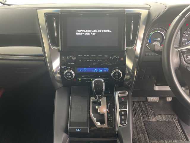 トヨタ ヴェルファイア ハイブリット 道央・札幌 2015(平27)年 5.1万km ホワイトパールクリスタルシャイン ・4WD/・JBLサウンドナビ/（CD DVD SD BT USB フルセグ）/・モデリスタエアロ（F S R）/・モデリスタマフラーカッター/・トヨタセーフティセンス/・純正フリップダウン/・両側パワースライドドア/・クルーズコントロール/・クリアランスソナー/・社外ワイヤレス充電/・パーキングアシスト/・LEDヘッドライト/・オートマチックハイビーム/・ハーフレザーシート