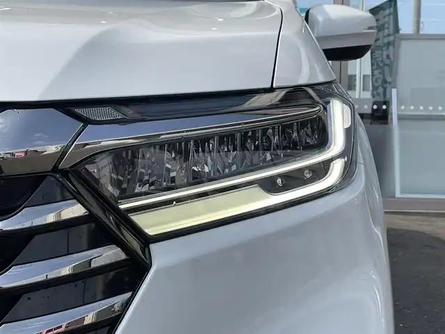 ホンダ オデッセイ アブソルート EX 青森県 2022(令4)年 3.3万km プラチナホワイトパール ４WD/純正ディーラーOPナビ(CD/DVD/BT/フルセグ)/15.6インチリア席モニター/両側パワースライドドア/ジェスチャーコントロールスライドドア/アダプティブクルーズコントロール/レーンキープアシスト/パーキングアシスト/クリアランスソナー/ブラインドスポットモニター/マルチビューモニター（フロント/バック/サイド/全周囲）/ビルトインETC2.0/アイドリングストップ/ECONモード/前席シートヒーター/ハーフレザーシート/革巻きステアリング/ステアリングリモコン/パドルシフト/プッシュスタート/スマートキー/LEDヘッドライト/オートライト/フォグランプ/純正フロアマット/ドアバイザー/18インチアルミホイール/社外AW付冬タイヤ積込/純正エンジンスターター/スペアキー